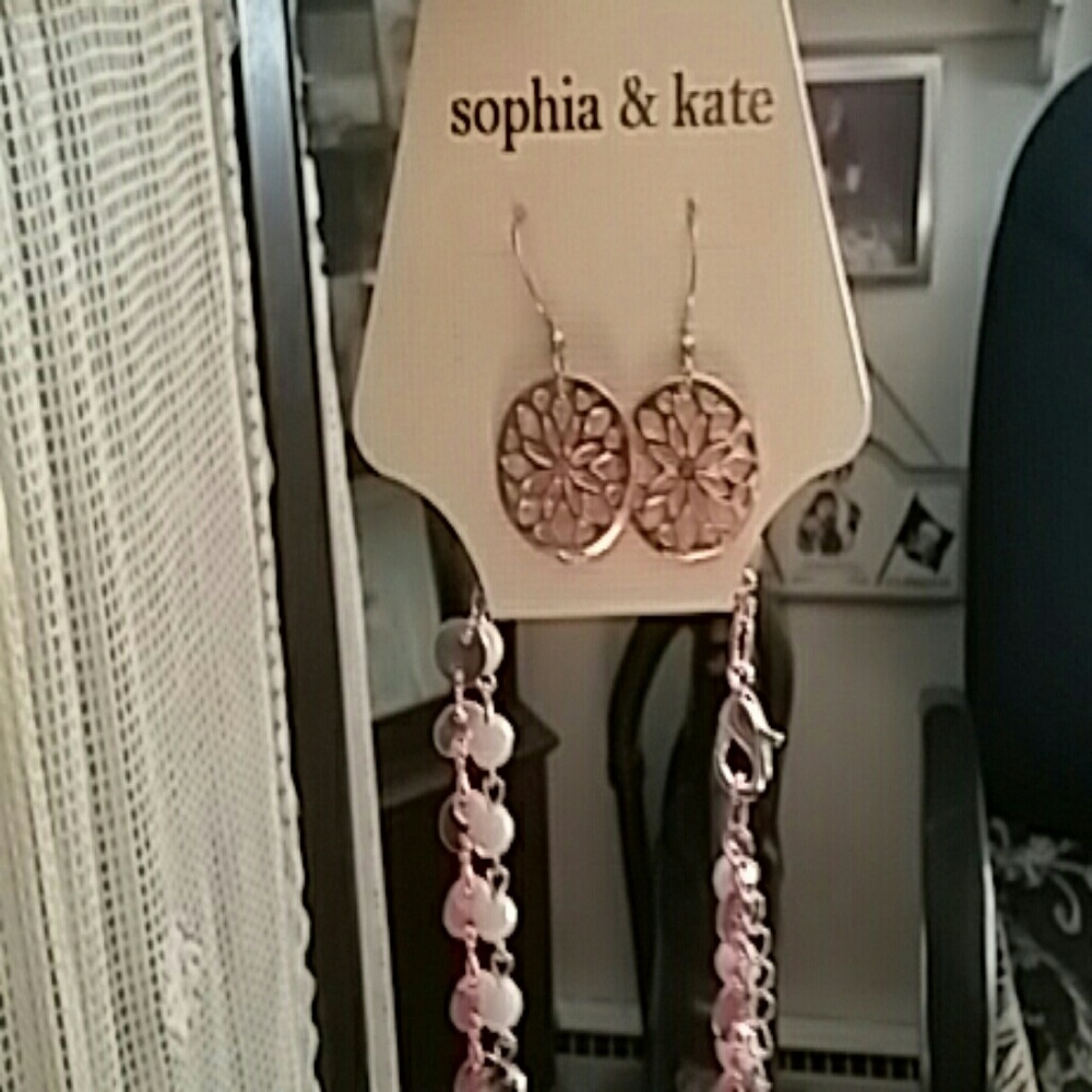 Necklace and matching earrings  with  tag